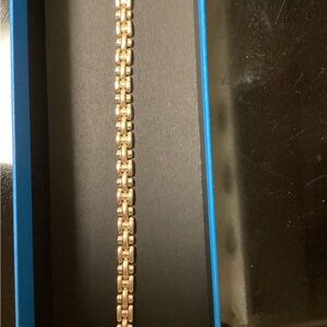 10 kt gold panther link bracelet.